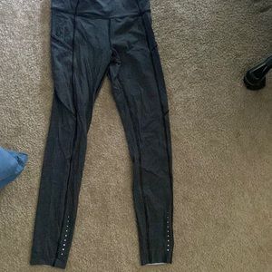 Lululemon fast and free size 4 black with little white dots barely worn